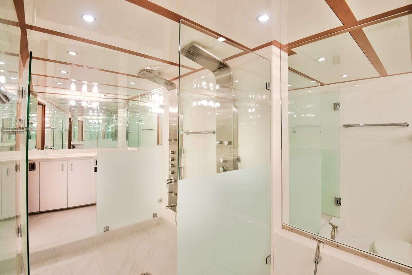 a room with white cabinets aboard DESLIZE Yacht for Sale