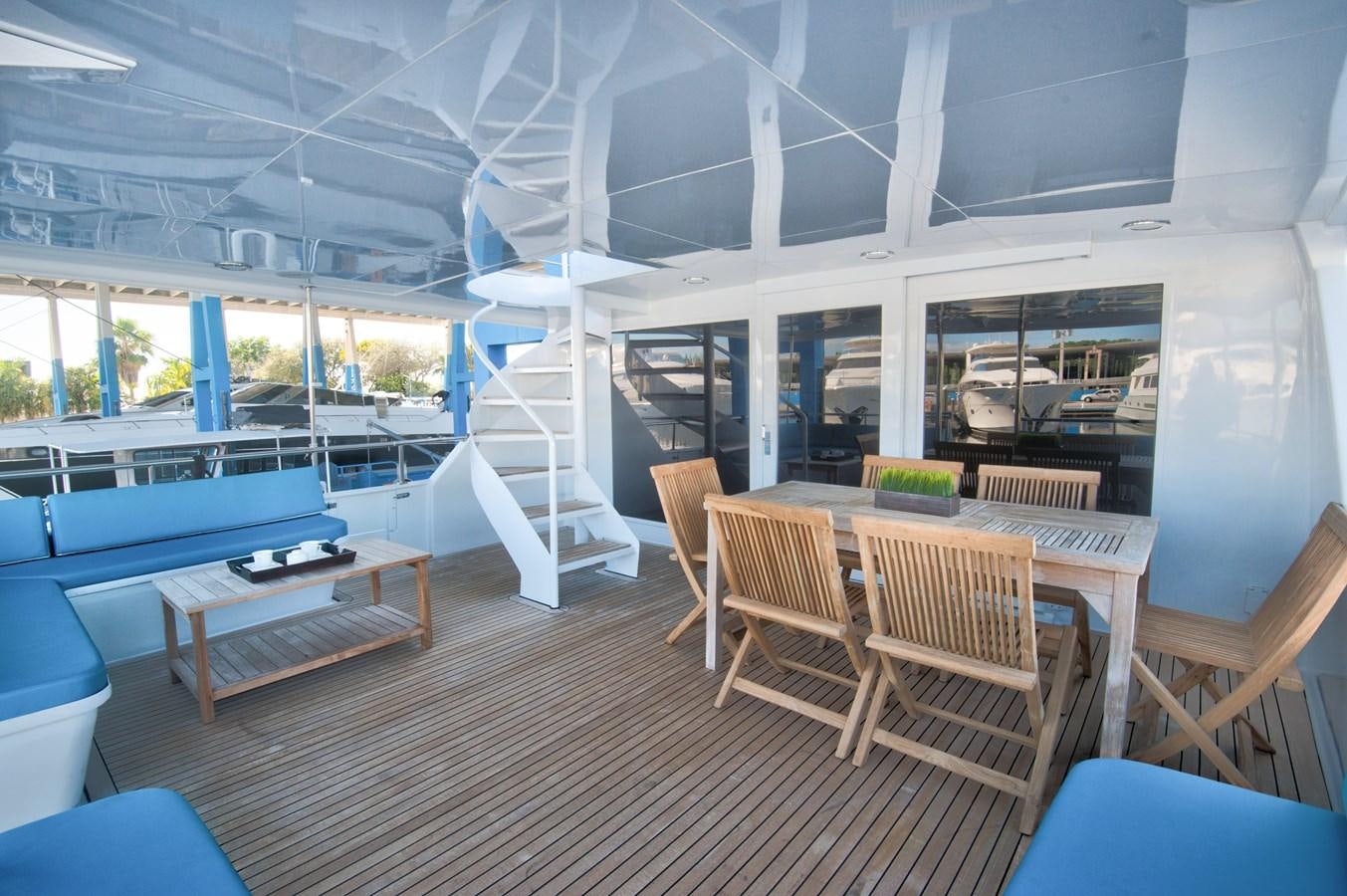 a room with a large window and a pool table aboard DESLIZE Yacht for Sale