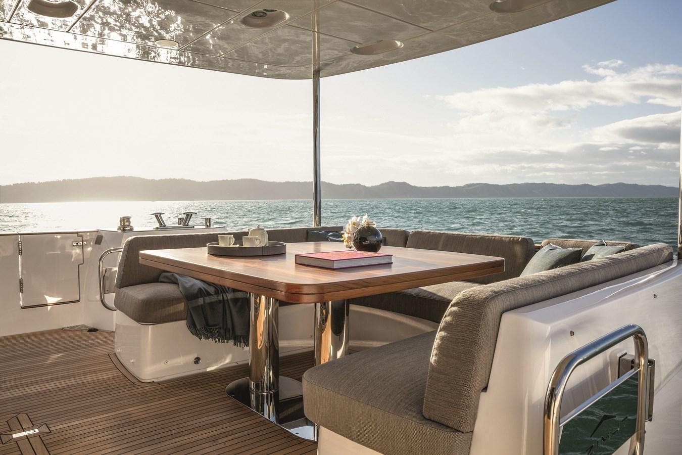 a table on a boat aboard 2023 MAGELLANO 66 Yacht for Sale