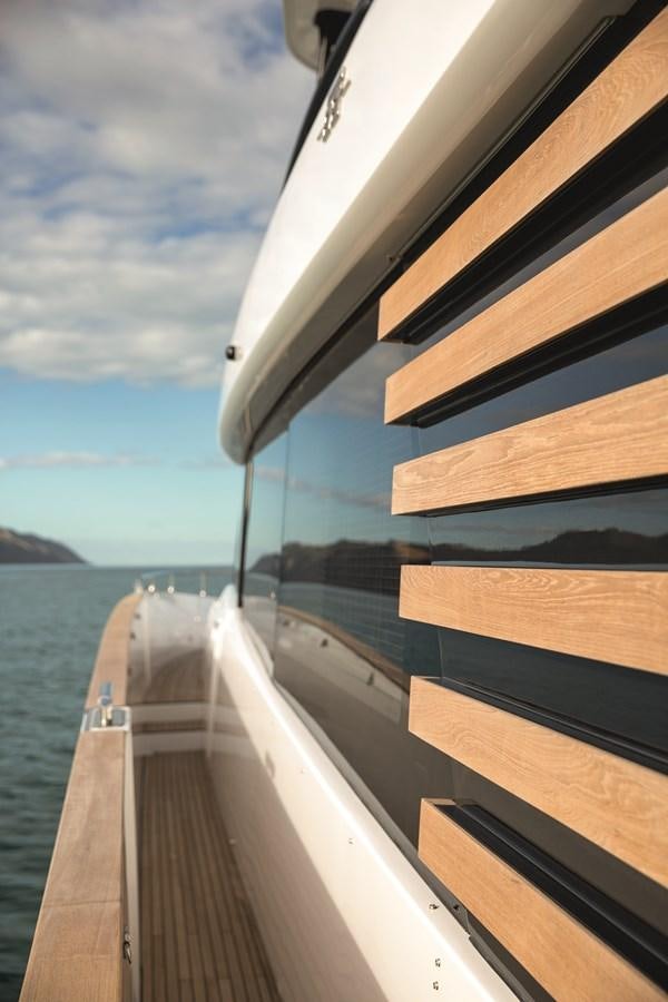 a boat on the water aboard 2023 MAGELLANO 66 Yacht for Sale