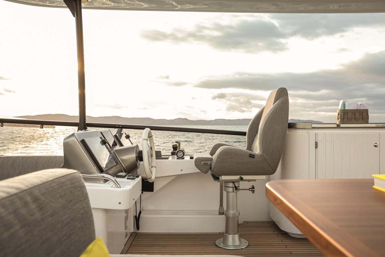 a boat on the water aboard 2023 MAGELLANO 66 Yacht for Sale