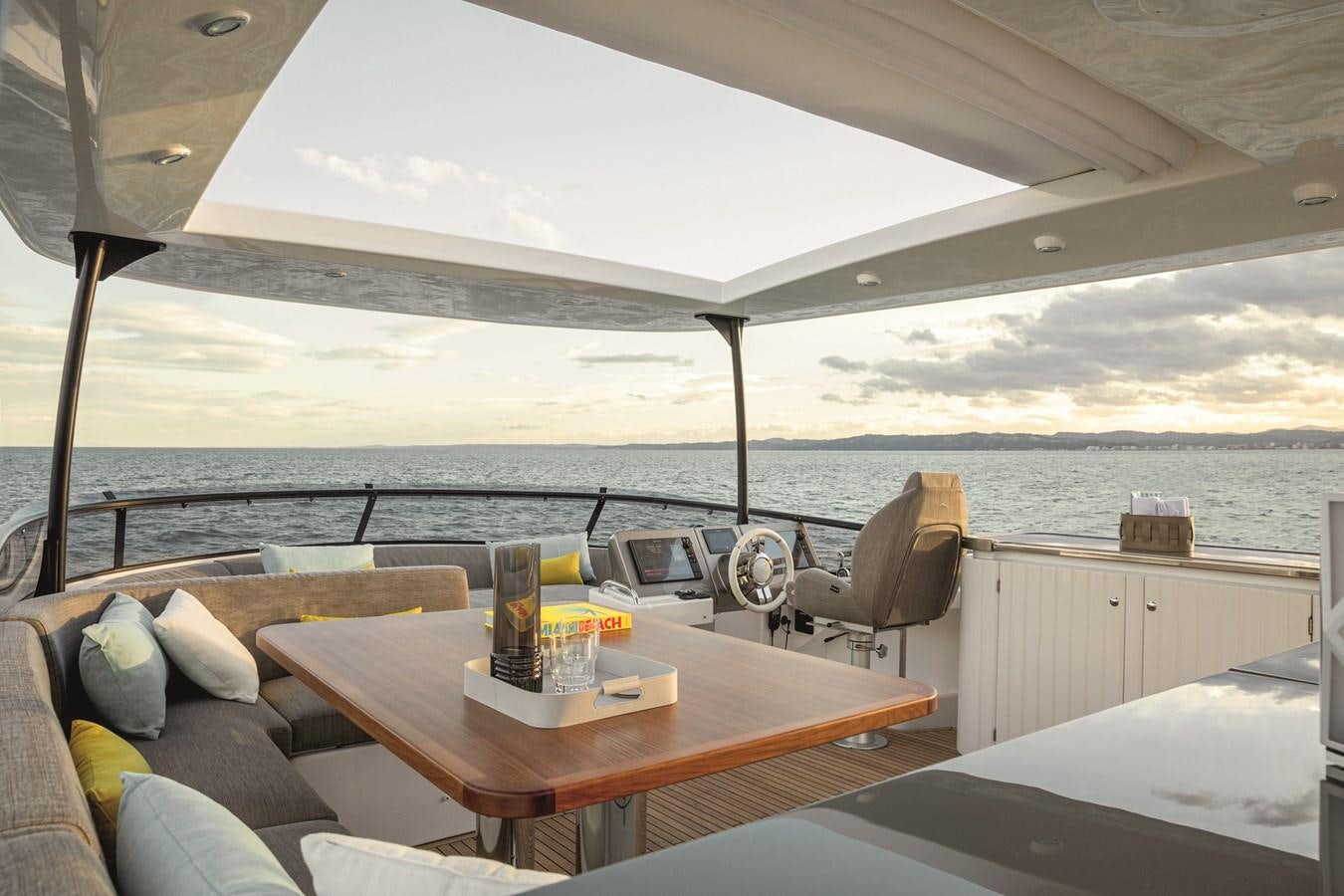 a table on a boat aboard 2023 MAGELLANO 66 Yacht for Sale
