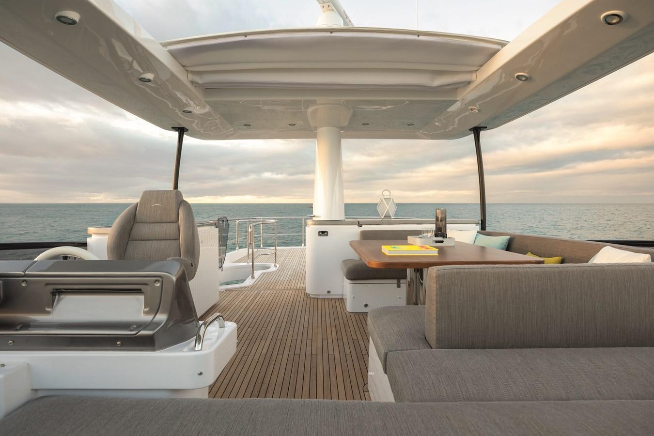a boat on the water aboard 2023 MAGELLANO 66 Yacht for Sale