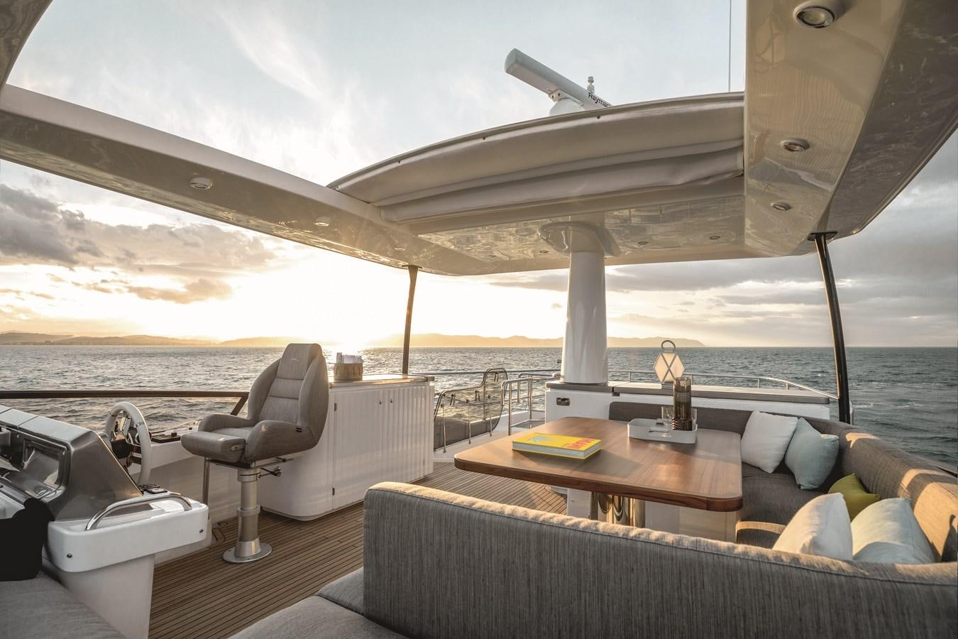 a boat on the water aboard 2023 MAGELLANO 66 Yacht for Sale