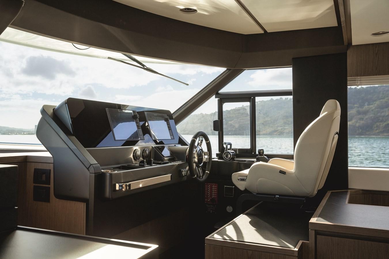 a car parked in a room aboard 2023 MAGELLANO 66 Yacht for Sale