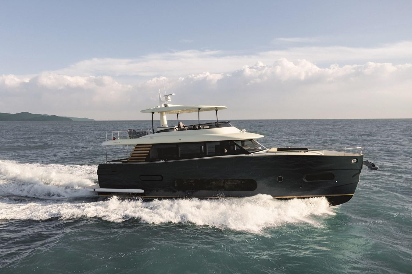 a boat in the water aboard 2023 MAGELLANO 66 Yacht for Sale
