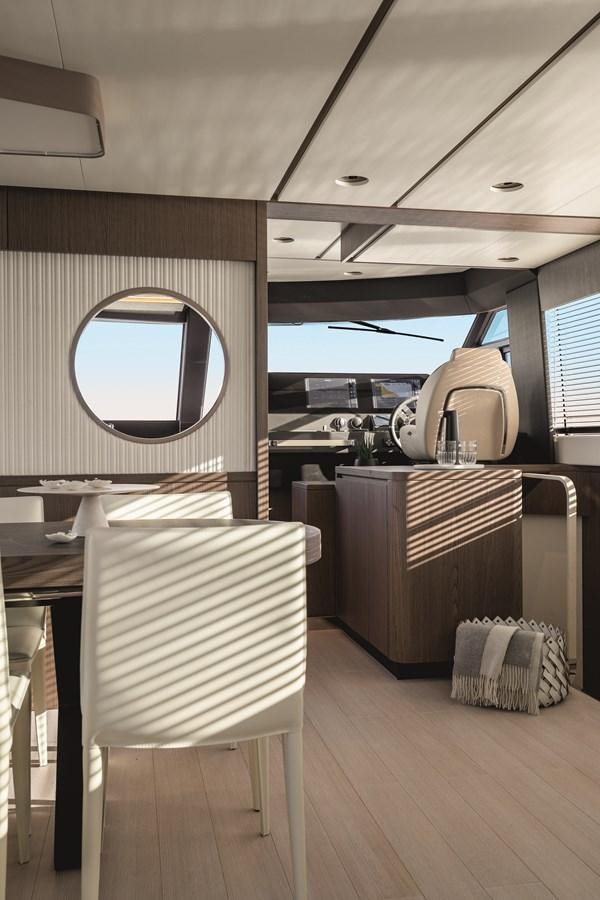 a room with a mirror and a desk aboard 2023 MAGELLANO 66 Yacht for Sale