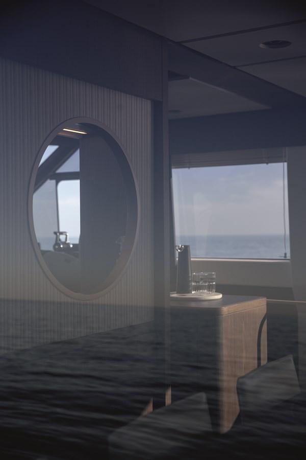 a room with a large mirror aboard 2023 MAGELLANO 66 Yacht for Sale