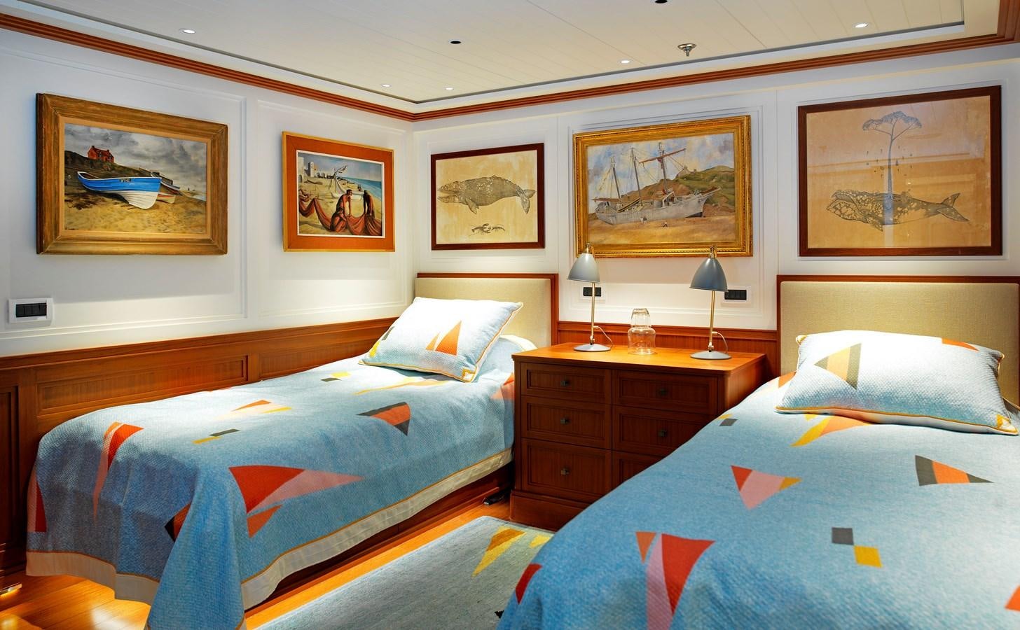a couple of beds in a hotel room aboard MESERRET II Yacht for Sale