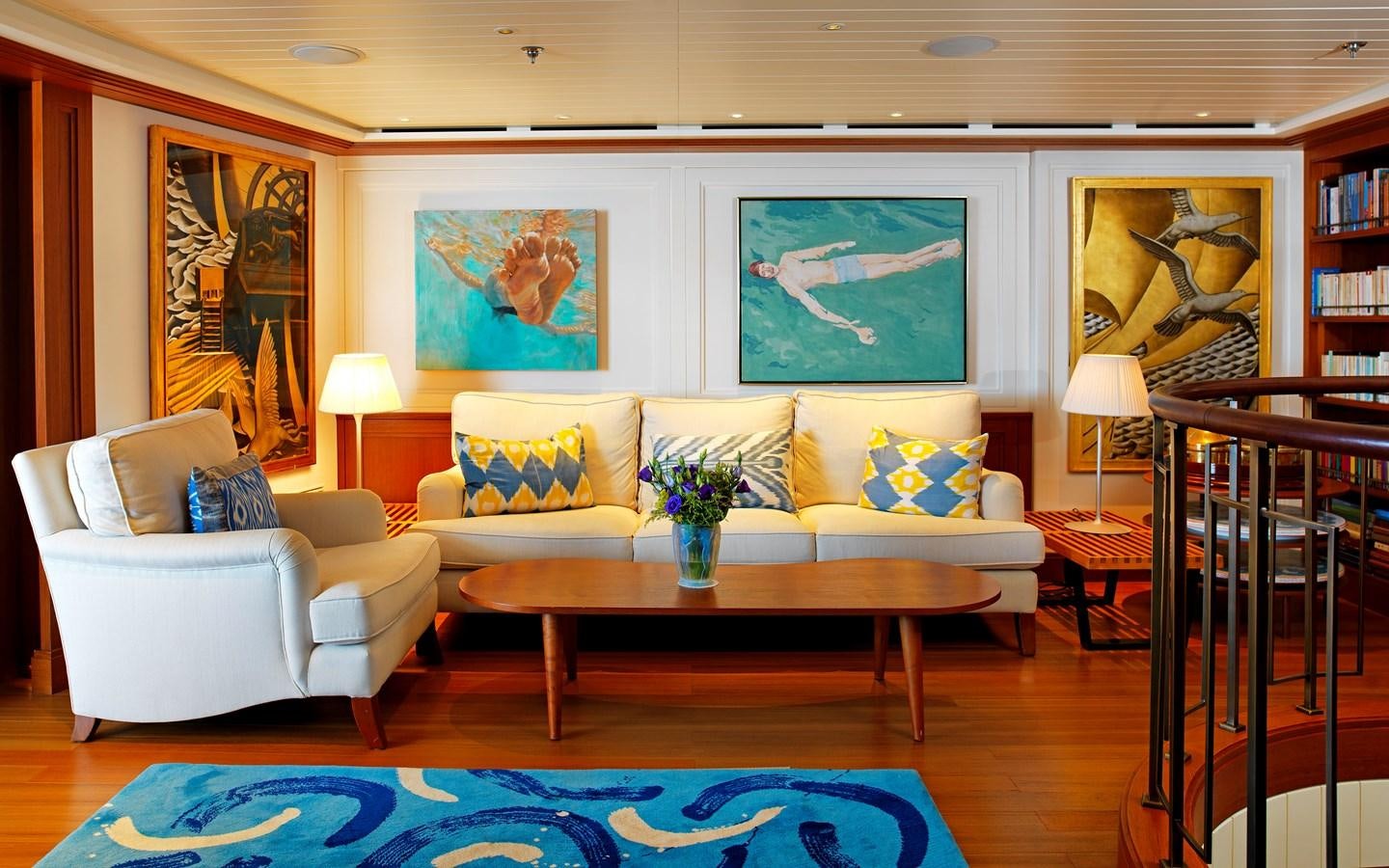 a living room with a couch and a coffee table aboard MESERRET II Yacht for Sale