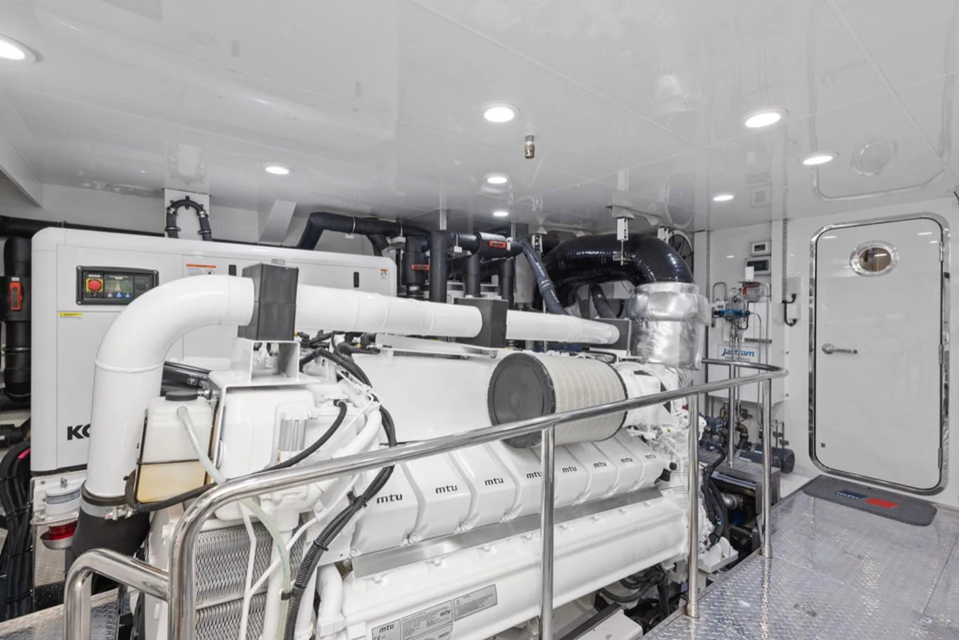 a room with machines and equipment aboard EVERGLADE Yacht for Sale