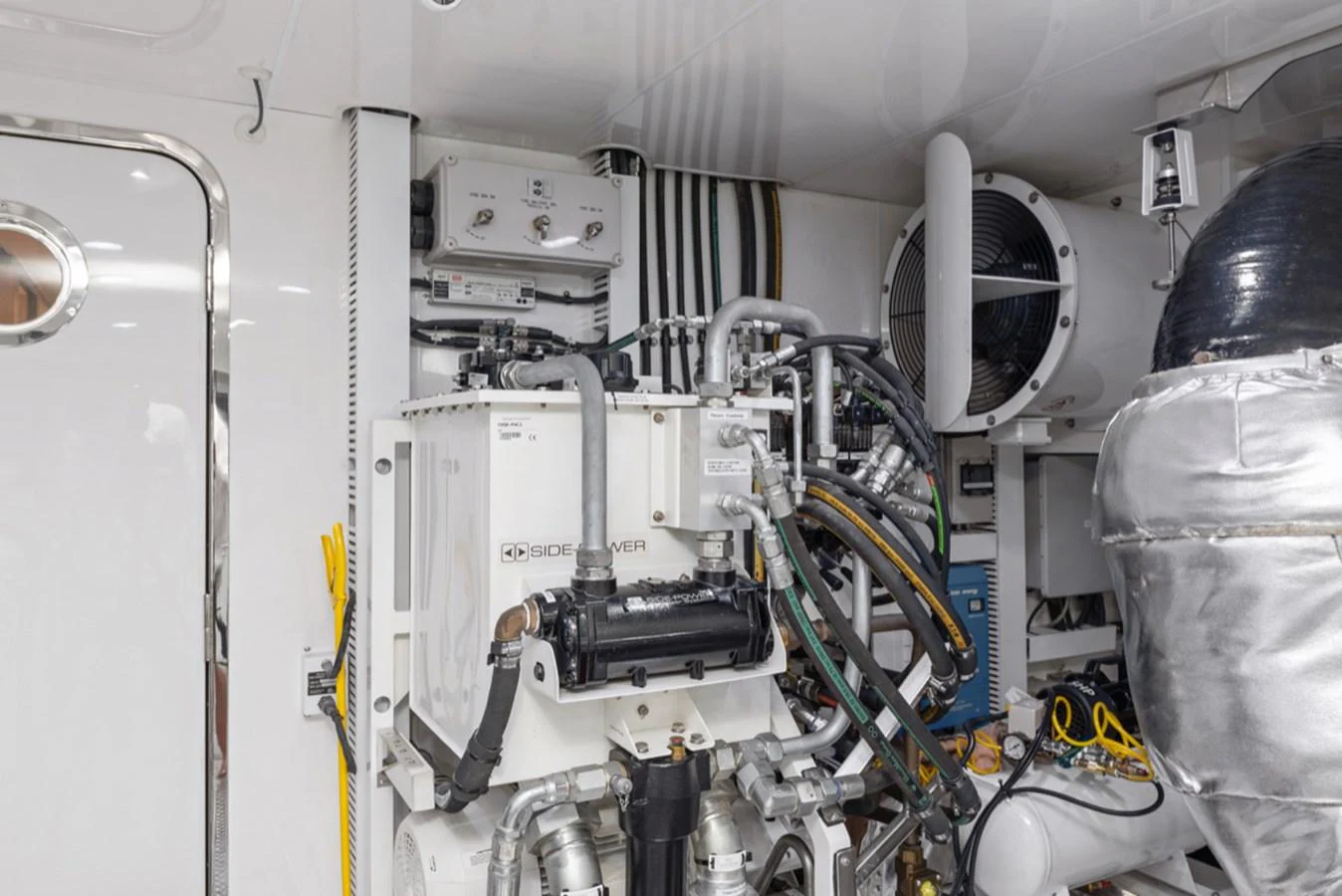 a machine with a large piece of equipment in it aboard EVERGLADE Yacht for Sale