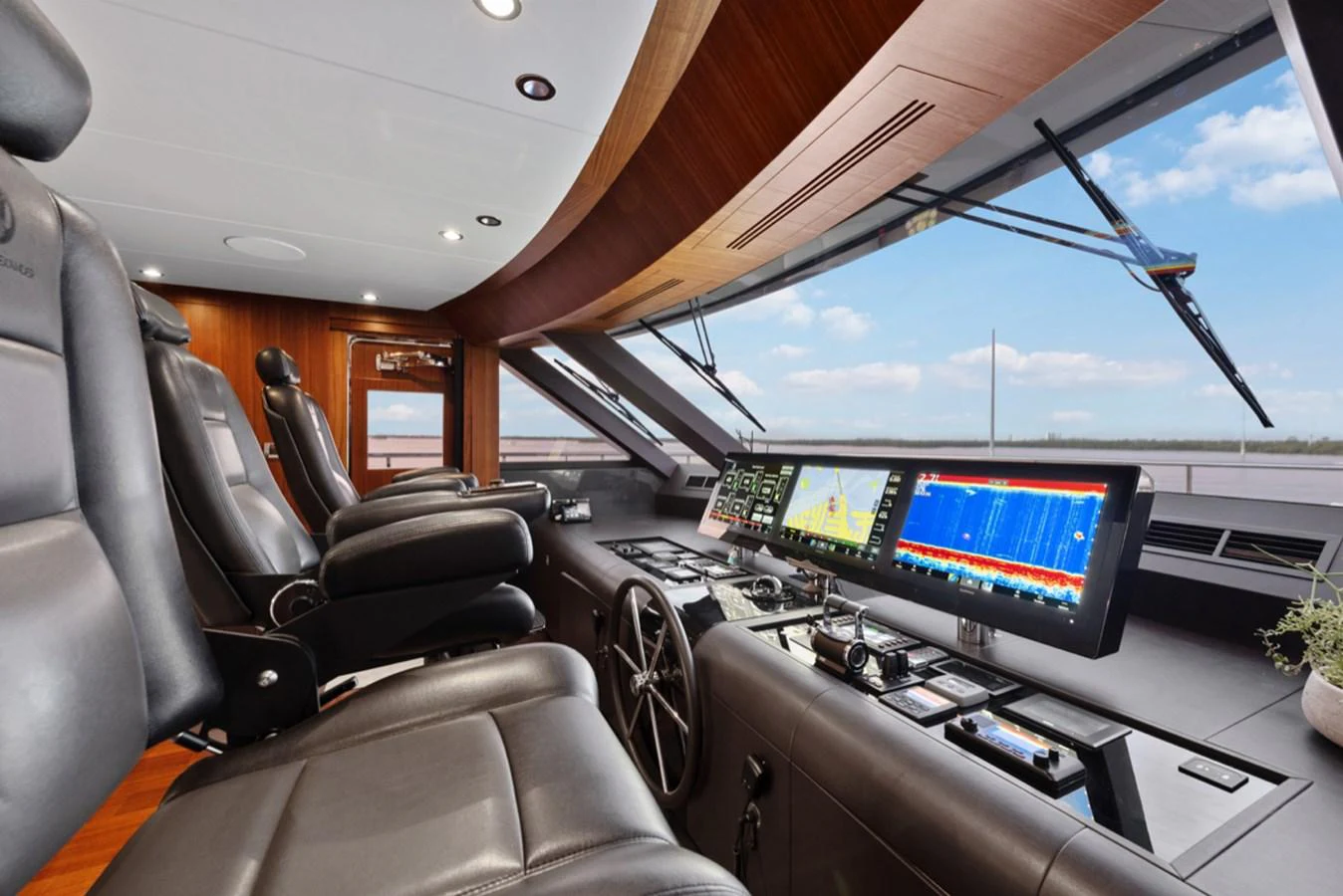 inside of a car with monitors and monitors aboard EVERGLADE Yacht for Sale