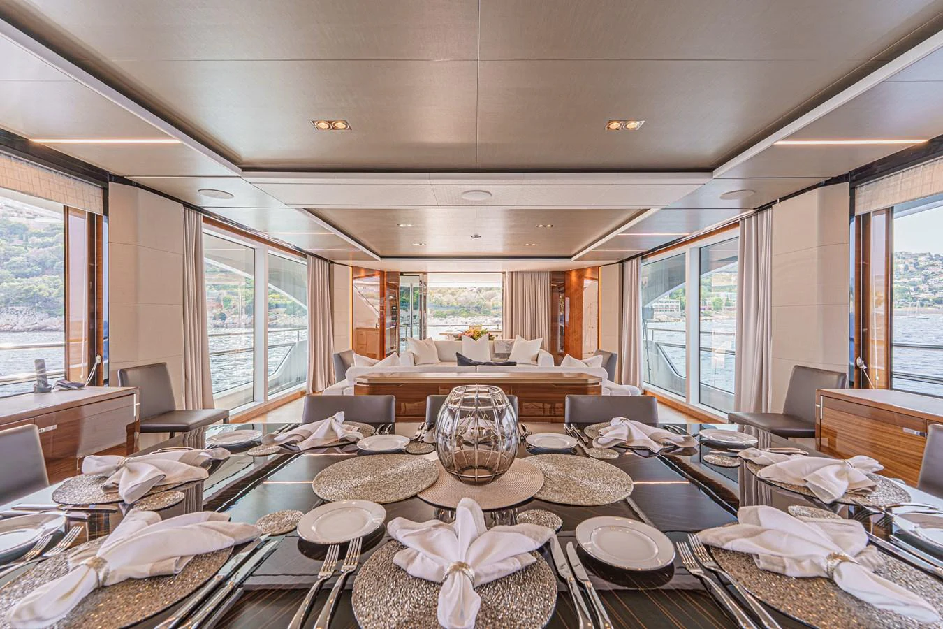 a dining room with a large window aboard AVALON Yacht for Sale