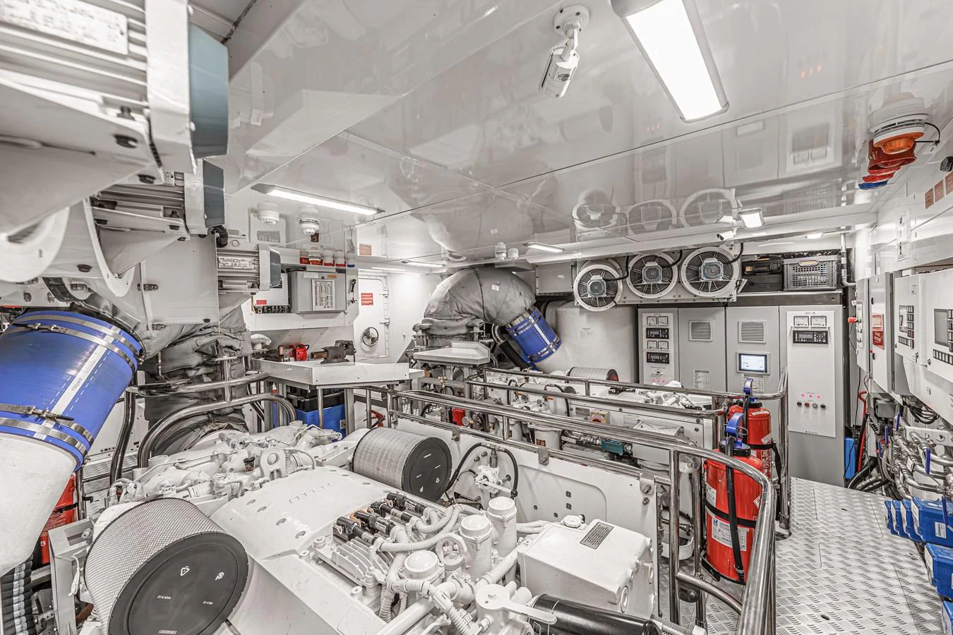 a room with machinery and pipes aboard AVALON Yacht for Sale