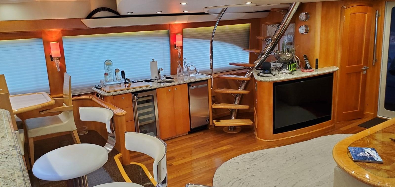 a kitchen with a bunk bed aboard RUMBERA Yacht for Sale