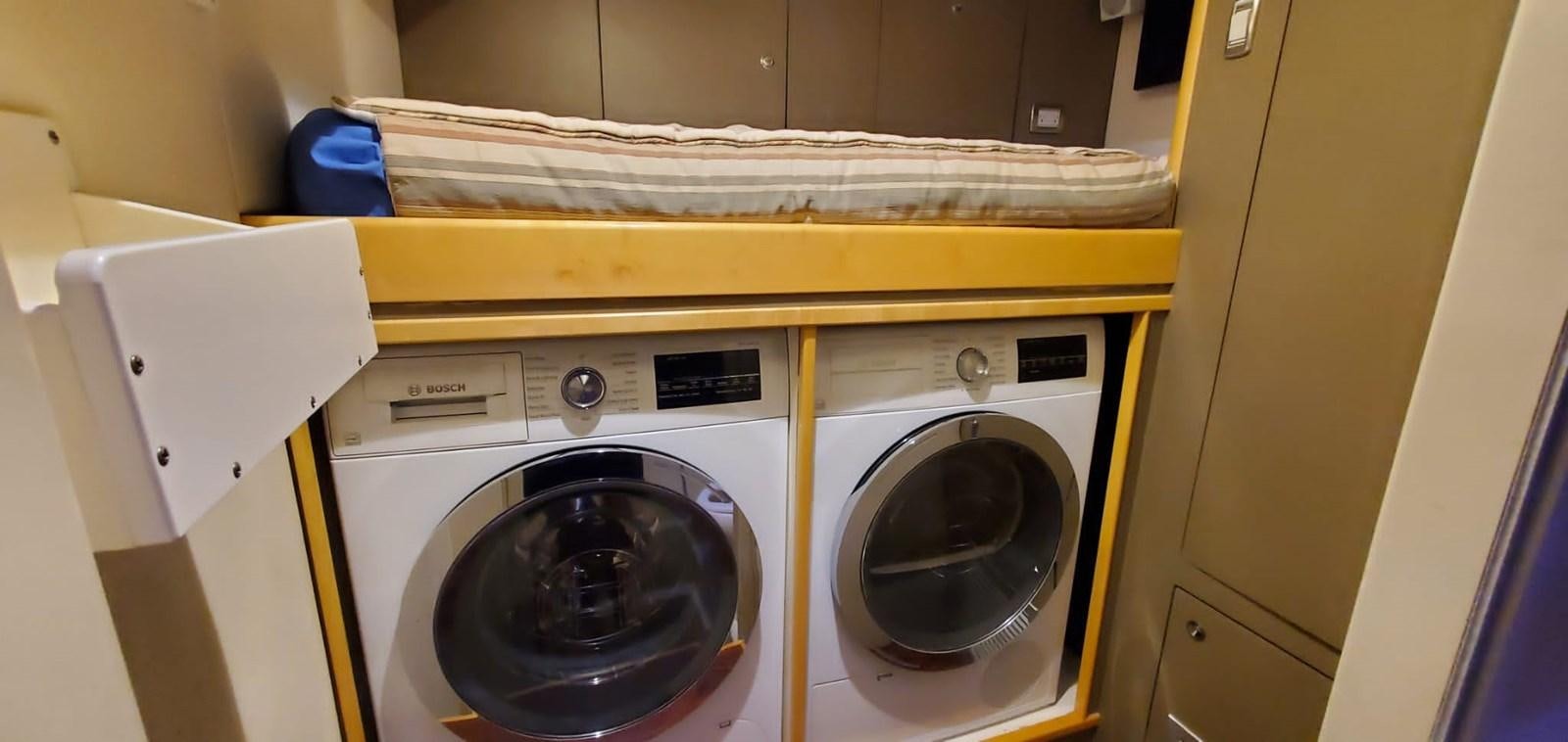 a laundry basket and dryer aboard RUMBERA Yacht for Sale