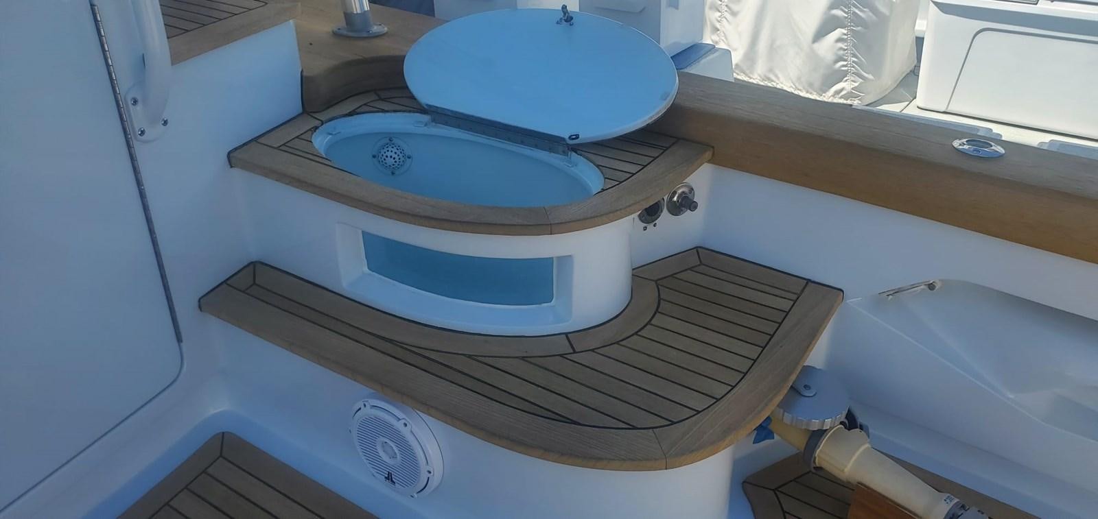 a toilet in a bathroom aboard RUMBERA Yacht for Sale