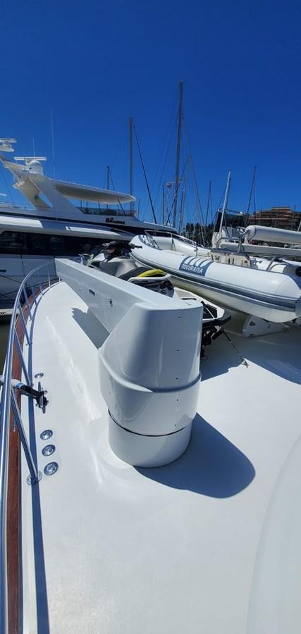a row of boats on a snowy day aboard RUMBERA Yacht for Sale