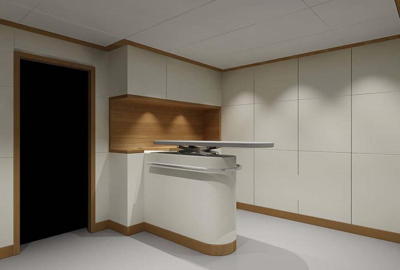a room with a white refrigerator aboard PHEROUSA Yacht for Sale