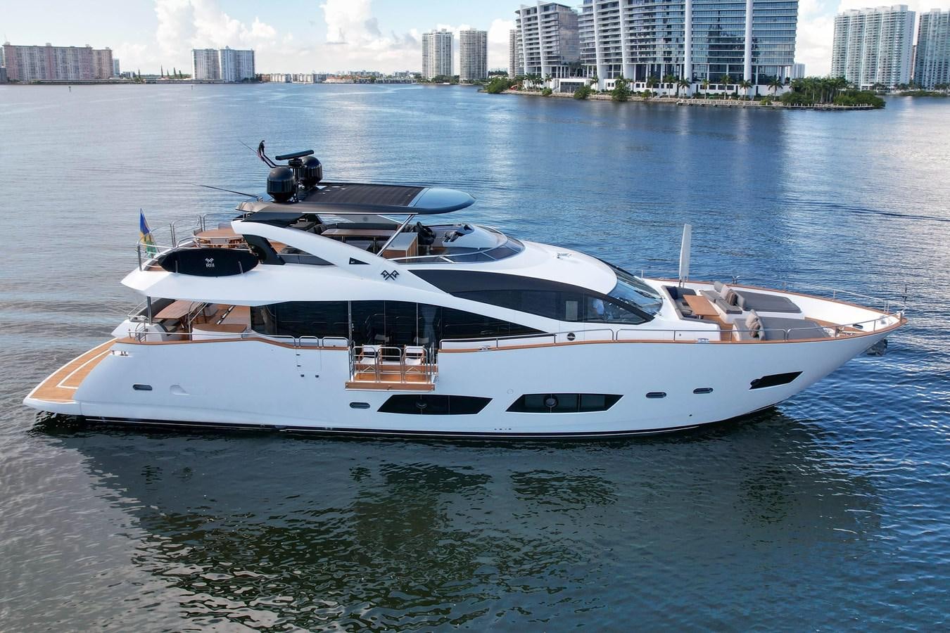 a white yacht on the water aboard 92' SUNSEEKER 2016 Yacht for Sale