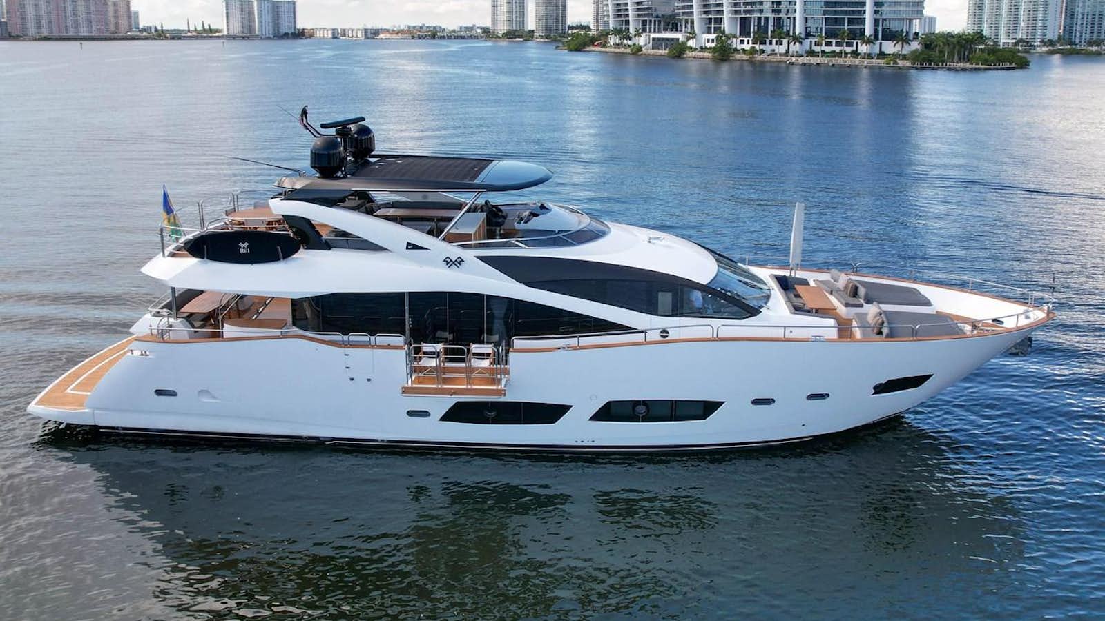 a white yacht on the water aboard 92' SUNSEEKER 2016 Yacht for Sale