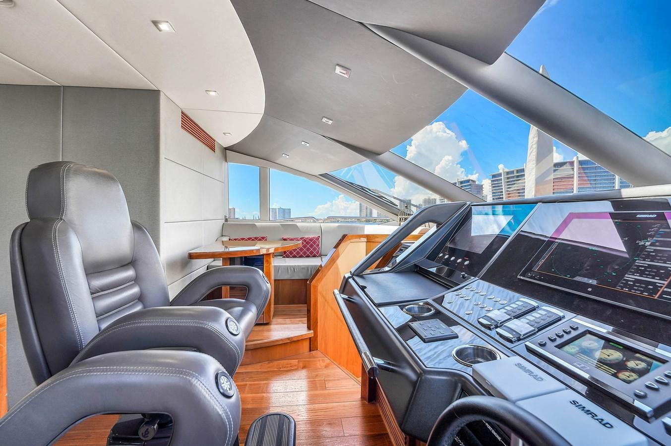 inside of a vehicle with a large window and a view of a city aboard 92' SUNSEEKER 2016 Yacht for Sale