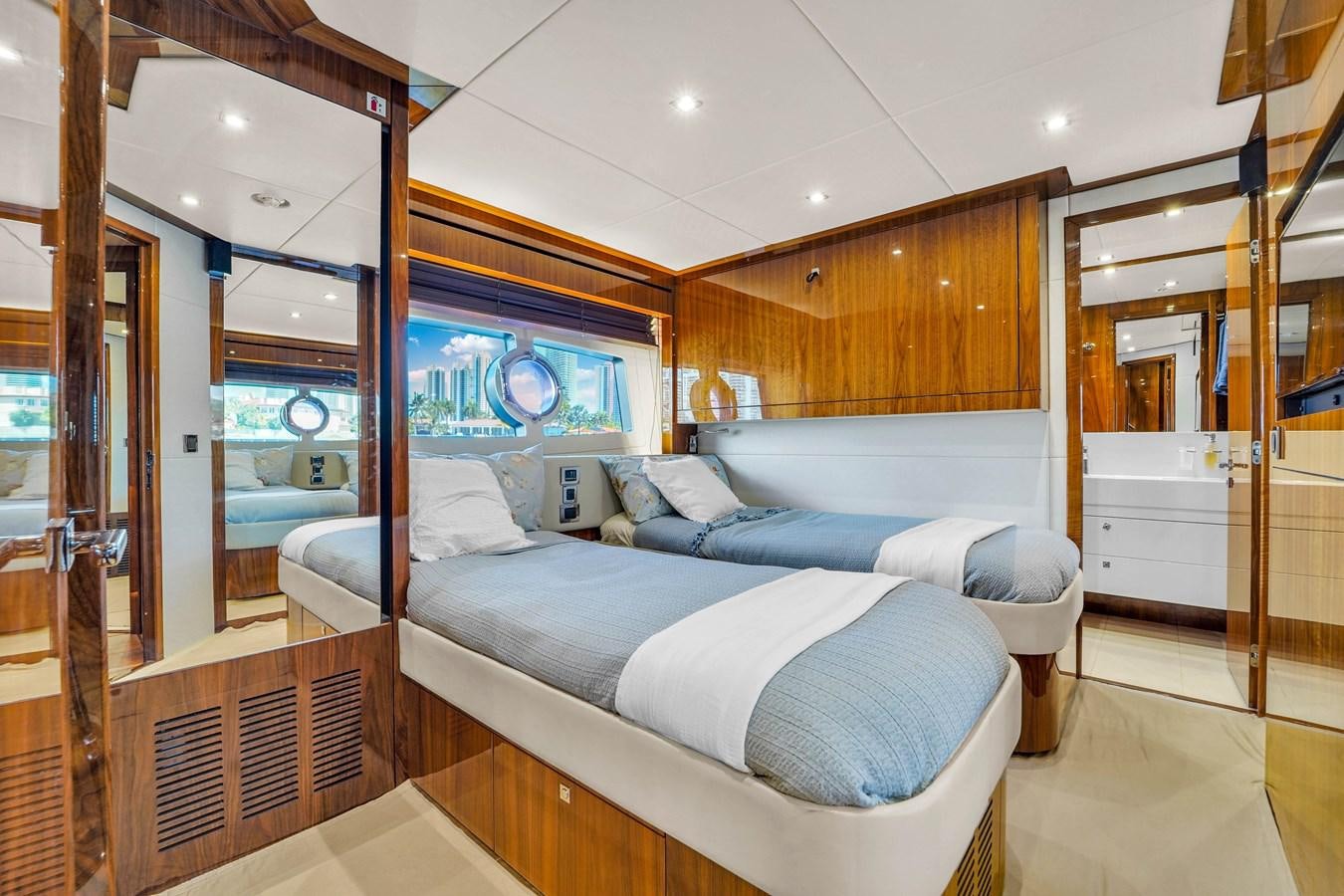 a bed in a room aboard 92' SUNSEEKER 2016 Yacht for Sale