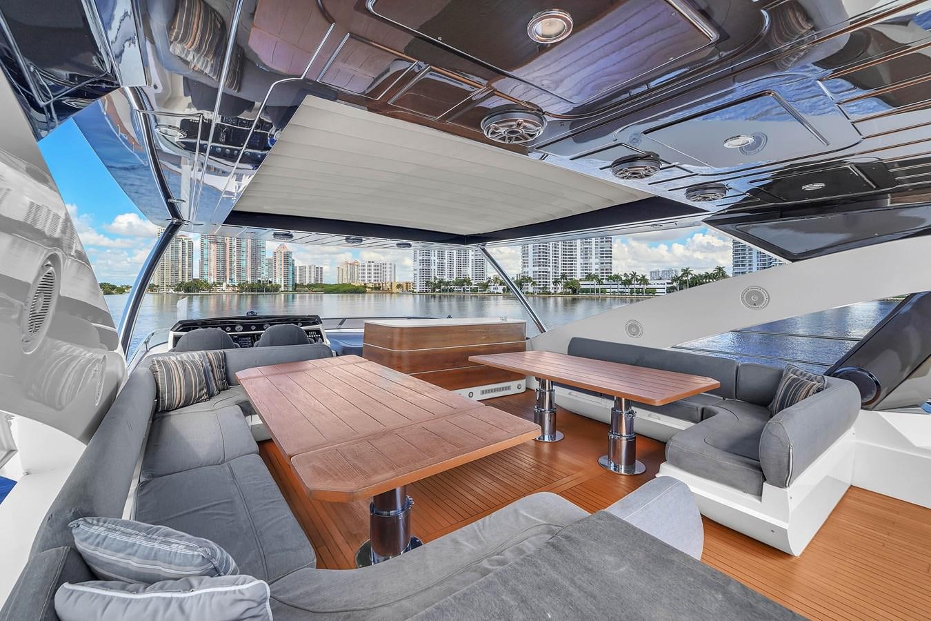 a room with a table and chairs aboard 92' SUNSEEKER 2016 Yacht for Sale