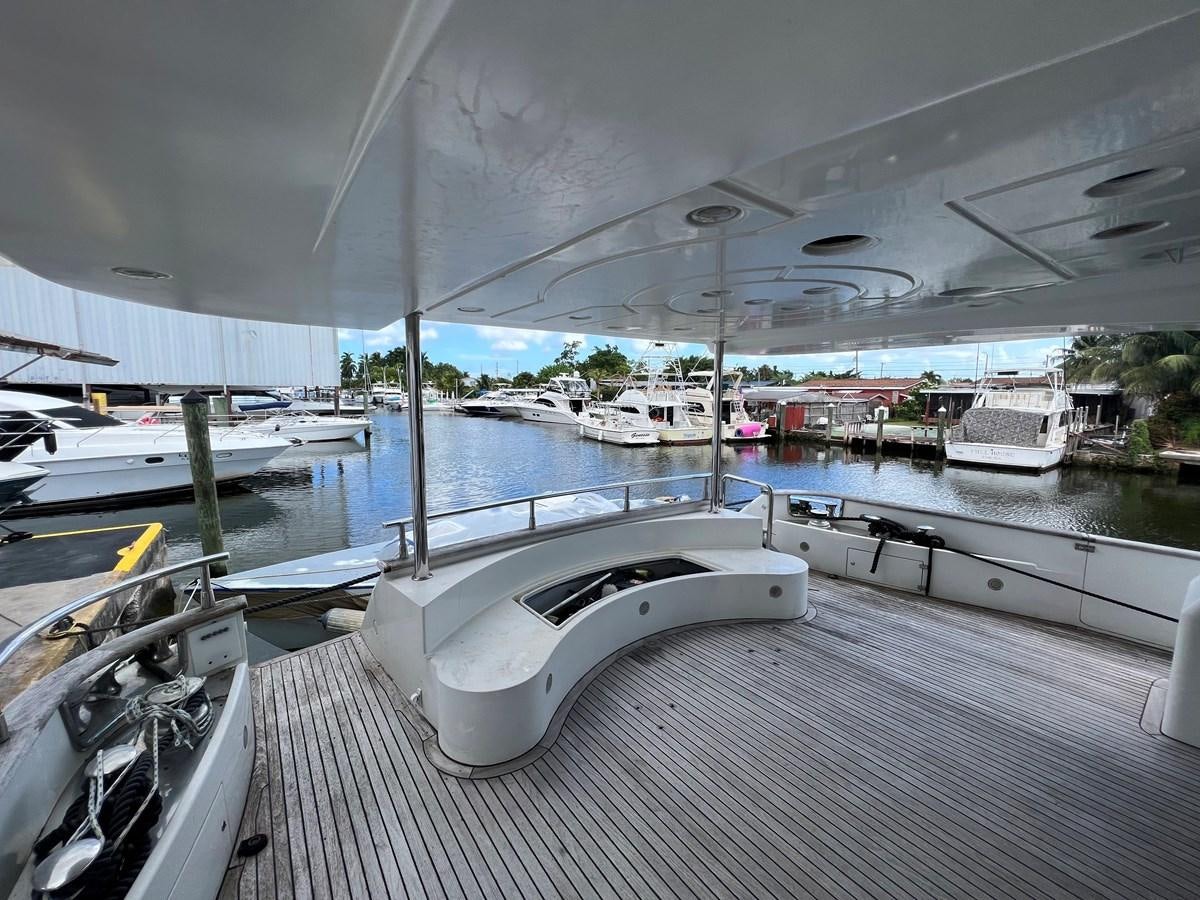 a boat on a deck aboard ØES3 Yacht for Sale