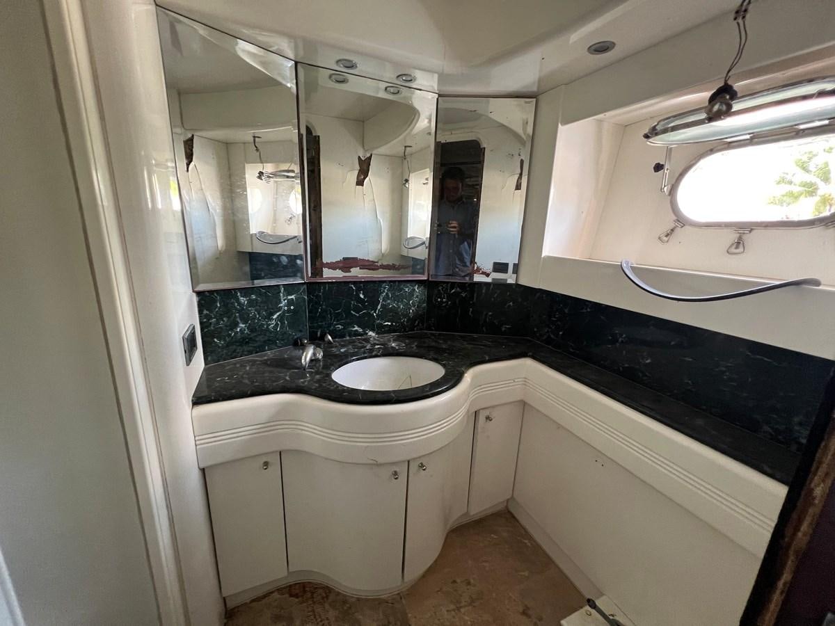 a bathroom with sinks and mirrors aboard ØES3 Yacht for Sale