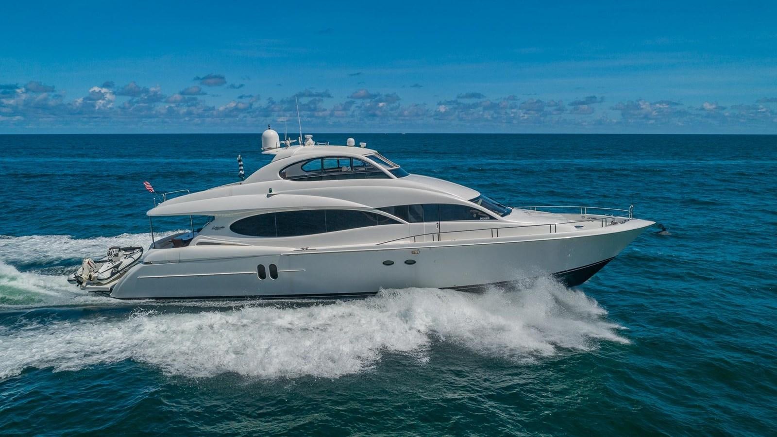a white yacht on the water aboard FINALLY Yacht for Sale