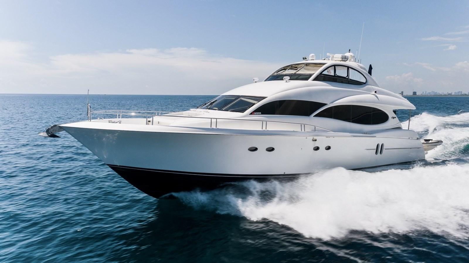 a white yacht on the water aboard FINALLY Yacht for Sale