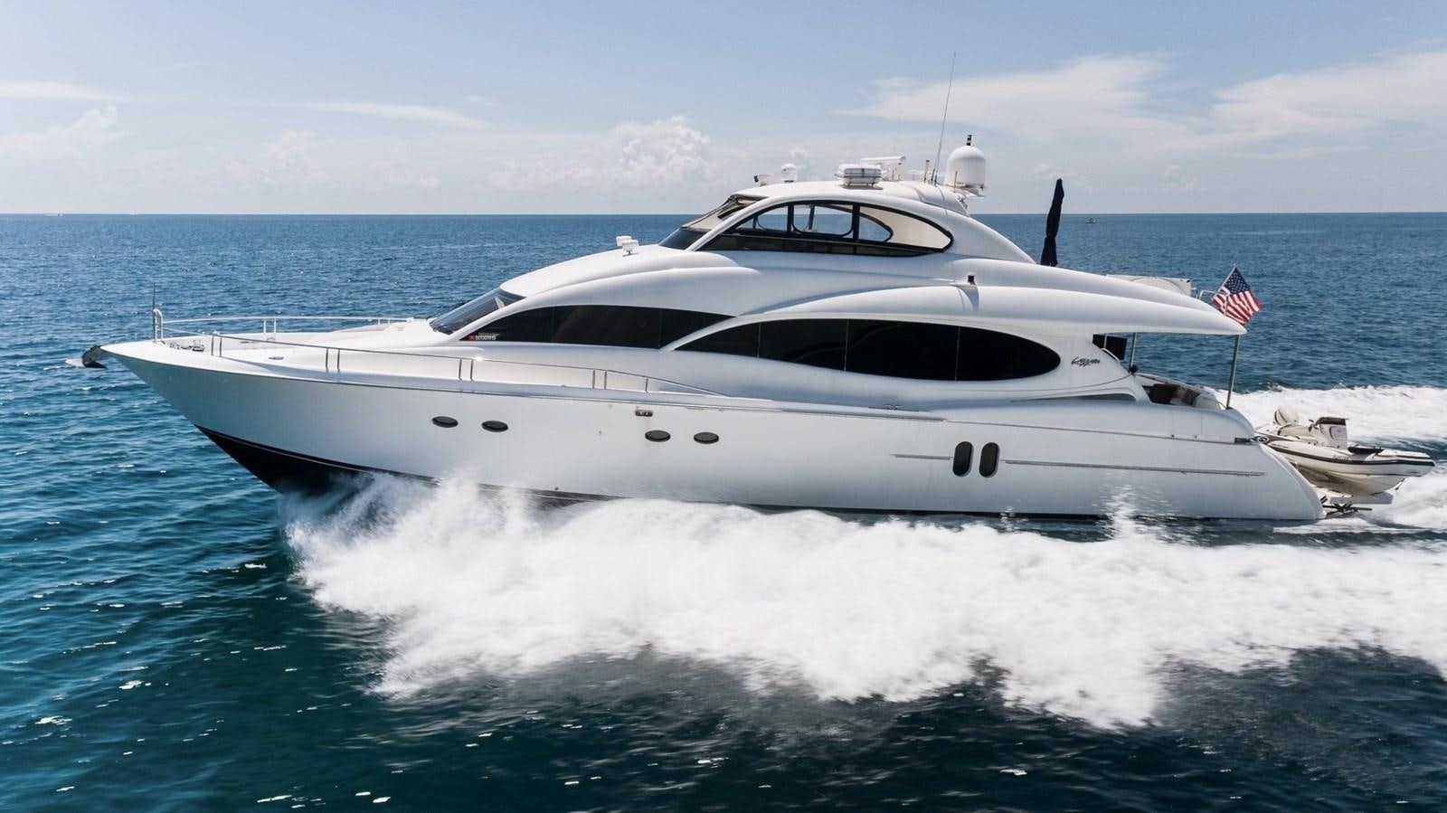 a white yacht in the water aboard FINALLY Yacht for Sale