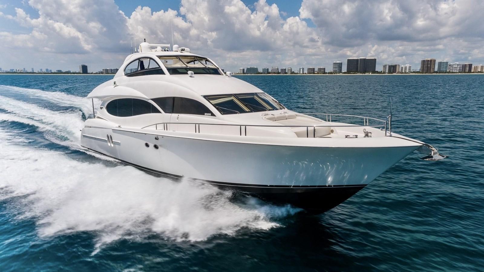 a white yacht on the water aboard FINALLY Yacht for Sale