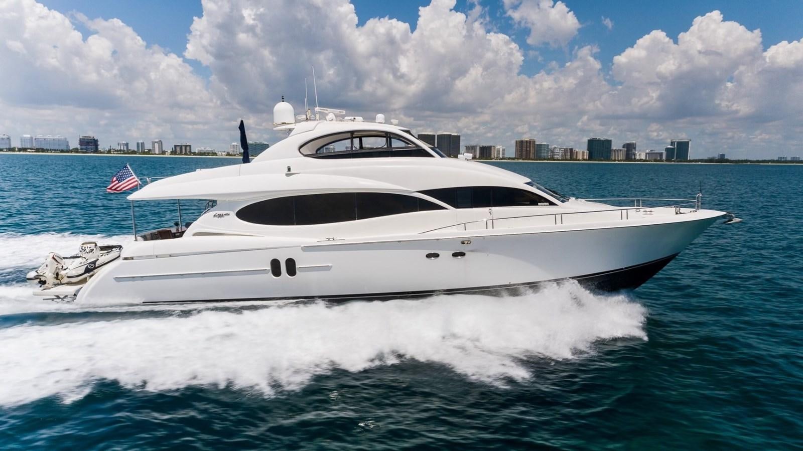 a white yacht in the water aboard FINALLY Yacht for Sale