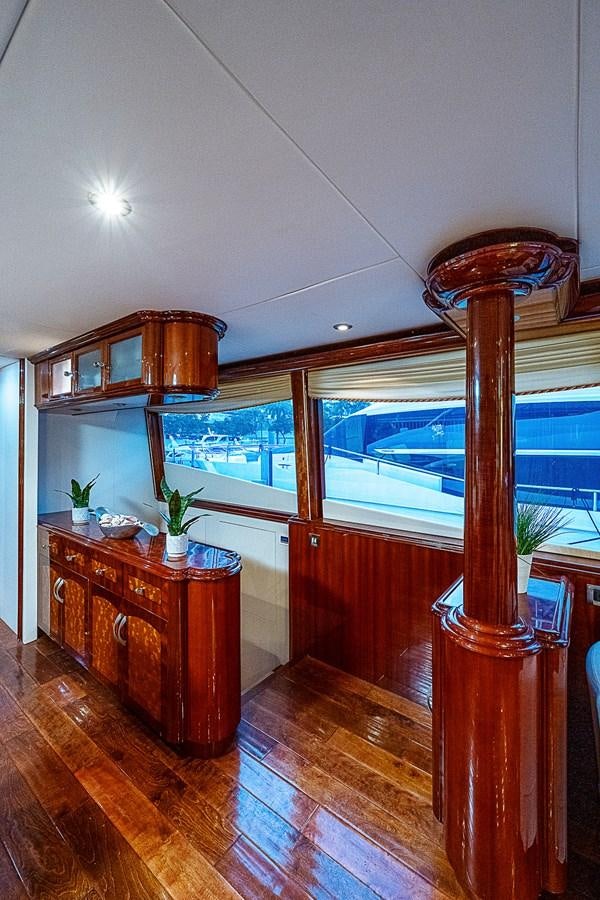 a large kitchen with a large window aboard FINALLY Yacht for Sale