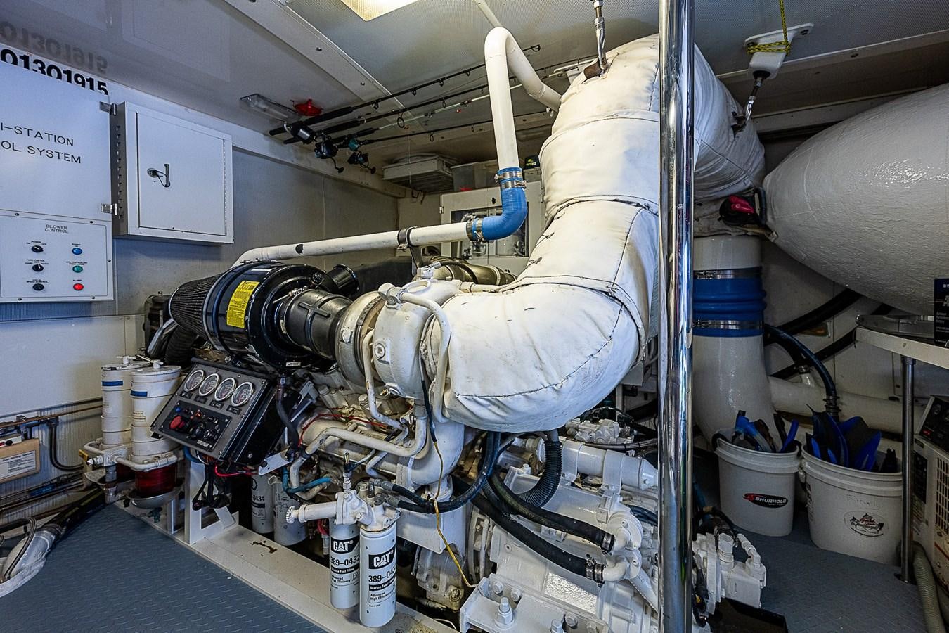 a large white machine with pipes aboard FINALLY Yacht for Sale