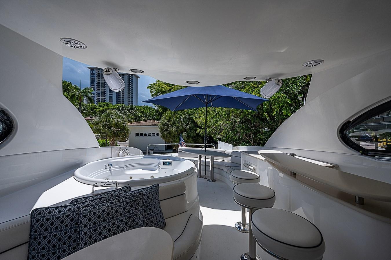 a room with a table and chairs aboard FINALLY Yacht for Sale