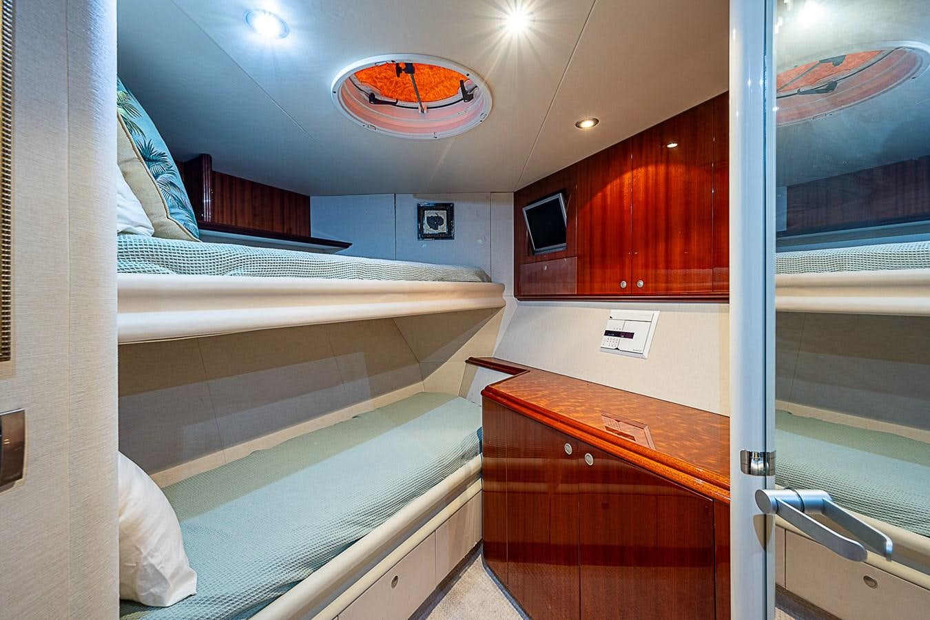 a room with bunk beds aboard FINALLY Yacht for Sale