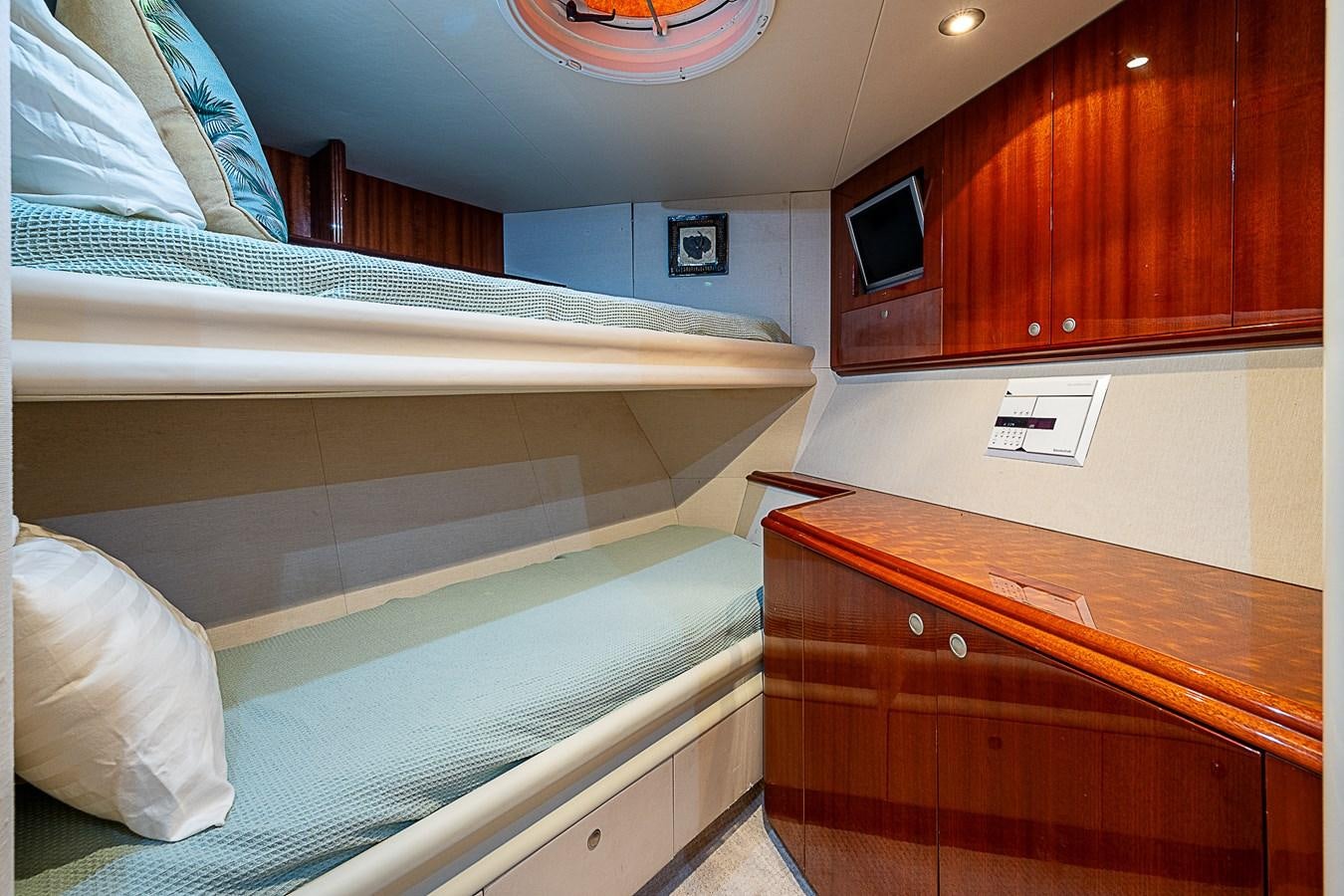 a room with bunk beds aboard FINALLY Yacht for Sale