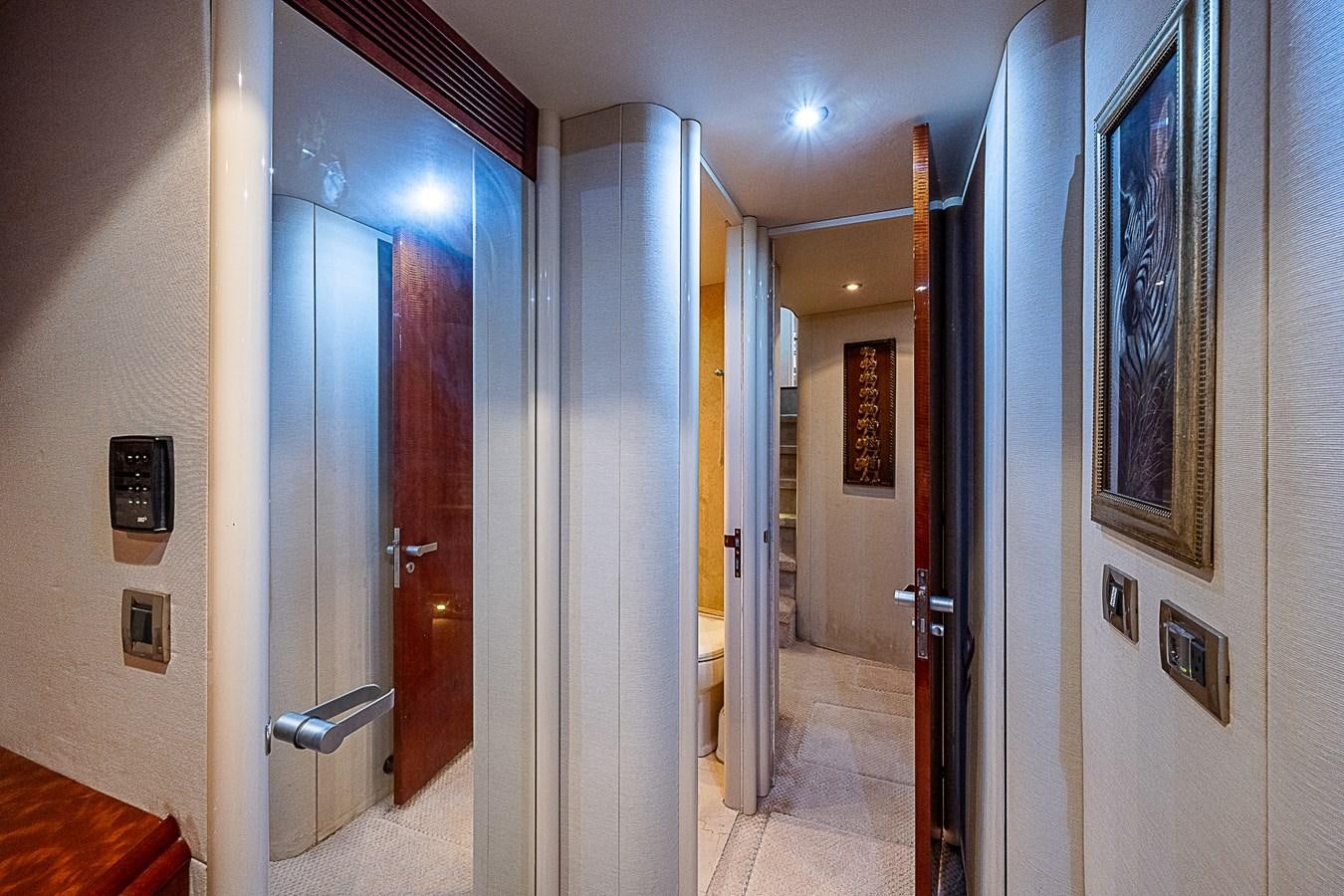 a hallway with doors aboard FINALLY Yacht for Sale