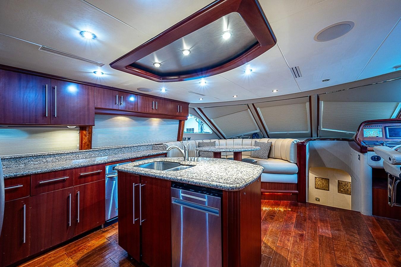 a kitchen with a large island aboard FINALLY Yacht for Sale