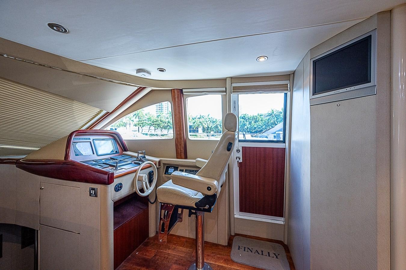 a room with a car and a desk and a chair aboard FINALLY Yacht for Sale