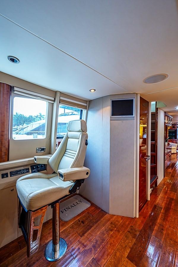 a room with a chair and a desk aboard FINALLY Yacht for Sale