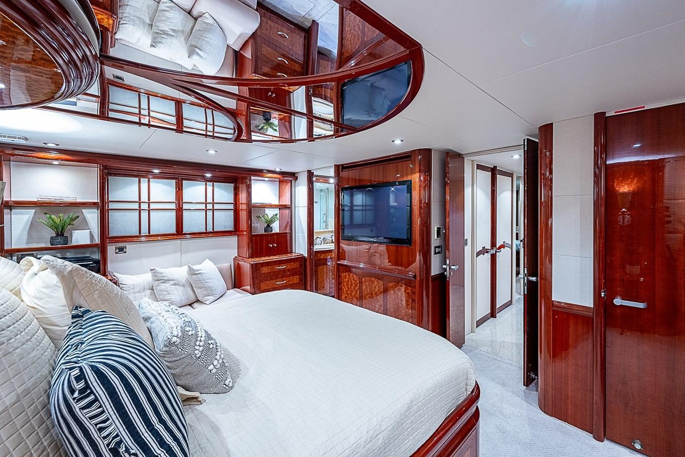 a bedroom with a large bed aboard FINALLY Yacht for Sale