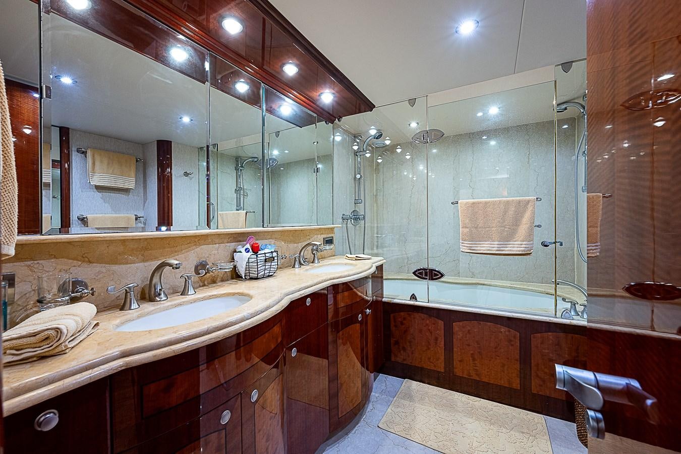 a bathroom with a large mirror aboard FINALLY Yacht for Sale