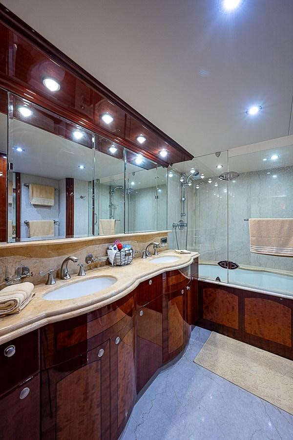 a bathroom with a large mirror aboard FINALLY Yacht for Sale