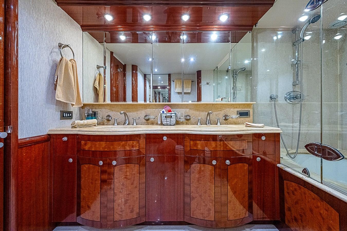 a bathroom with a sink and a mirror aboard FINALLY Yacht for Sale
