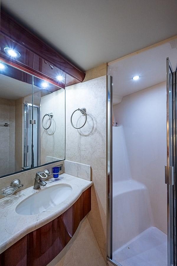 a bathroom with a sink and a shower aboard FINALLY Yacht for Sale